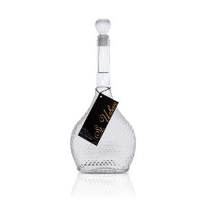 St. Urban Blutorange Vodka in a textured glass bottle with a round stopper and a black tag on a white background.