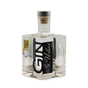 A square glass bottle of St. Urban Gin, with a silver cap and cork, and a 'World Gin Awards Gold' sticker.