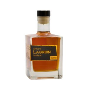 A bottle of Grappa Lagrein barrique from Rubino, a limited edition, shown against a white backdrop.