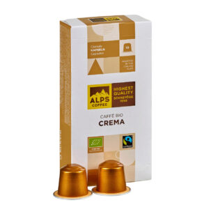 Box of Alps Coffee Caffe Bio Crema capsules with two golden capsules in front of it.