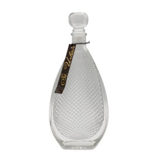 Clear glass decanter with a textured surface and "St. Urban" label, set against a white background.