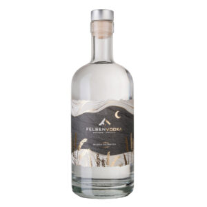Bottle of Felsenvodka Brennerei Distillery silver filtered vodka with a mountain design on its label.