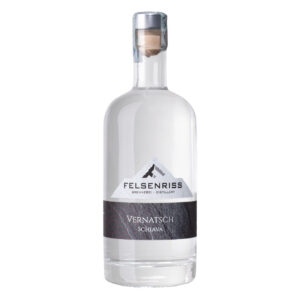Bottle of Felsenriss Vernatsch Schiava, a distilled beverage, with a distinctive logo on the label.
