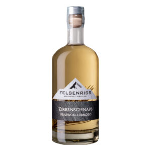 Bottle of Felsenriss Zirbenschnaps Grappa Al Cirmolo. Bottle has clear glass, silver top, and mountain logo.